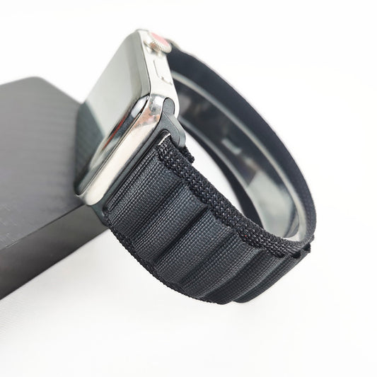Smartwatch with a black woven strap on a white background