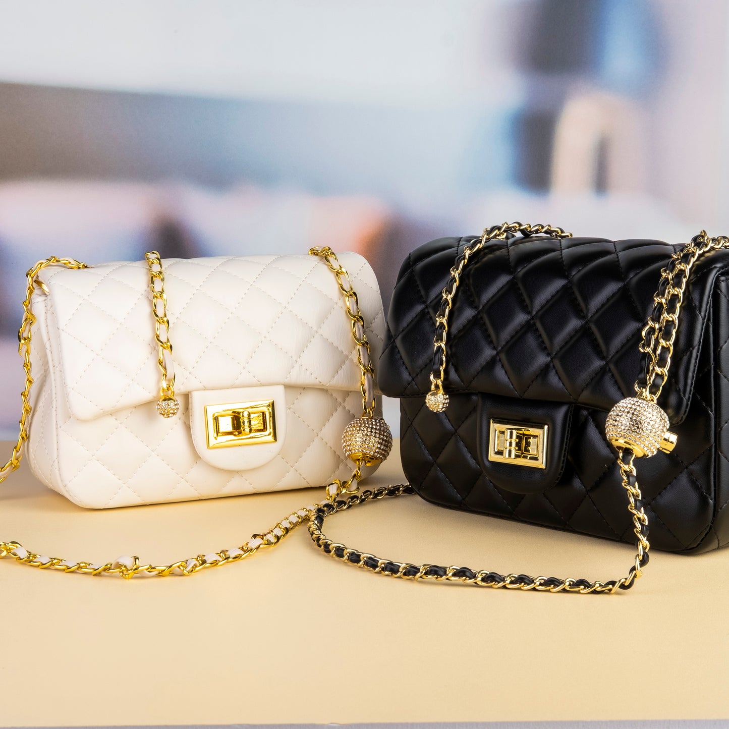 Fabufabu Cowhide leather gold ball and gold chain handbag - starcopia design store