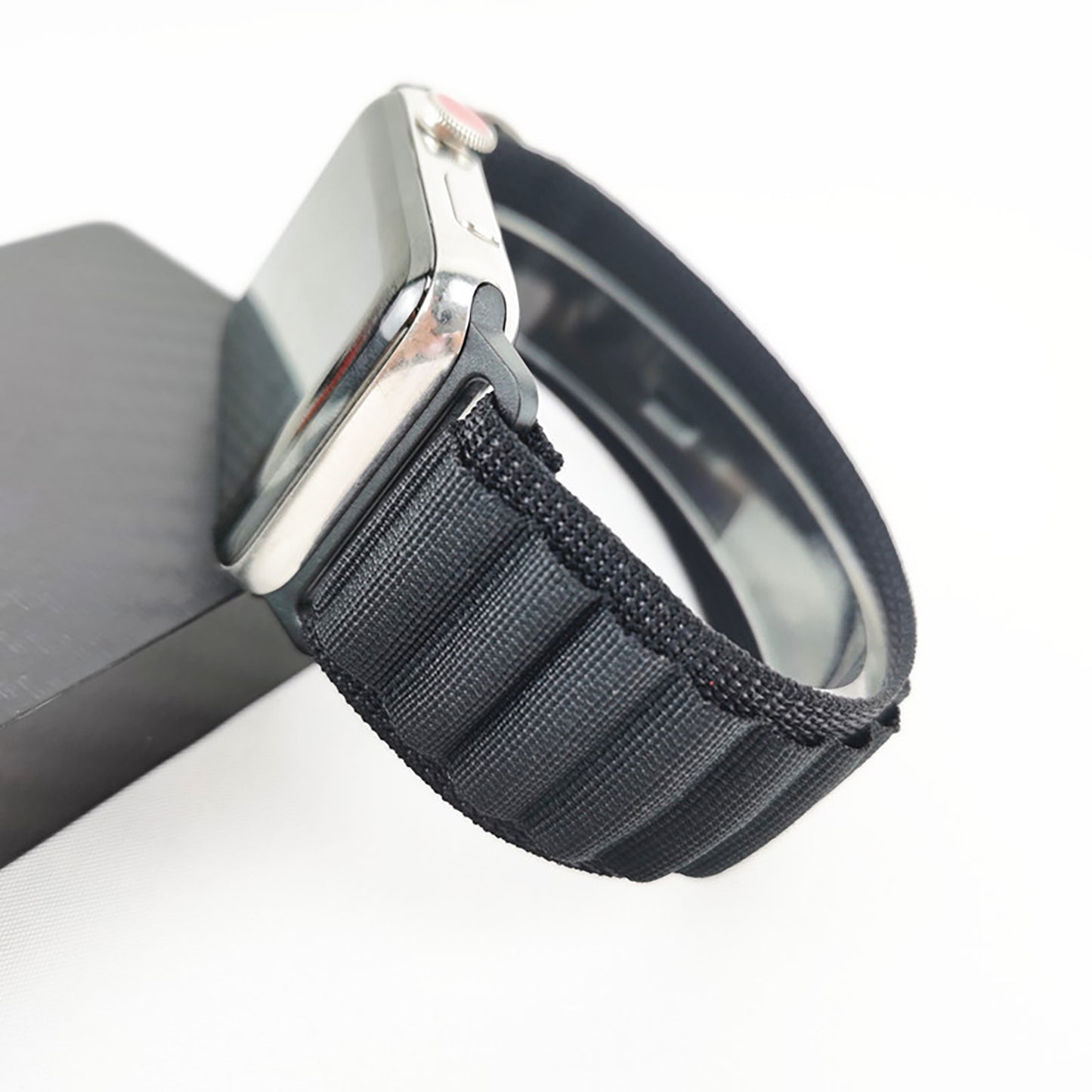 Smartwatch with a black woven strap on a white background