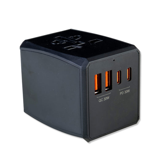 Black multi-port charging adapter with USB-C ports on a white background